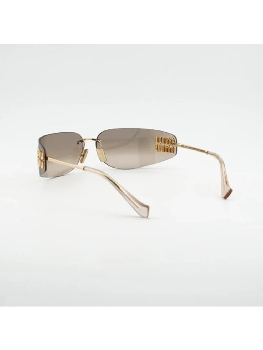 Miu Miu MUA51S 5AK20P Sunglasses Gold Rectangle Frame, Bronze Mirror Lenses